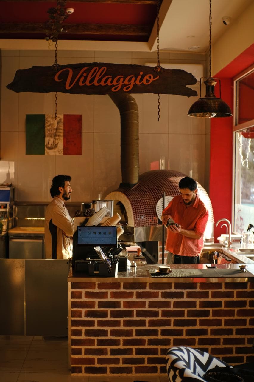 Chef preparing pizza